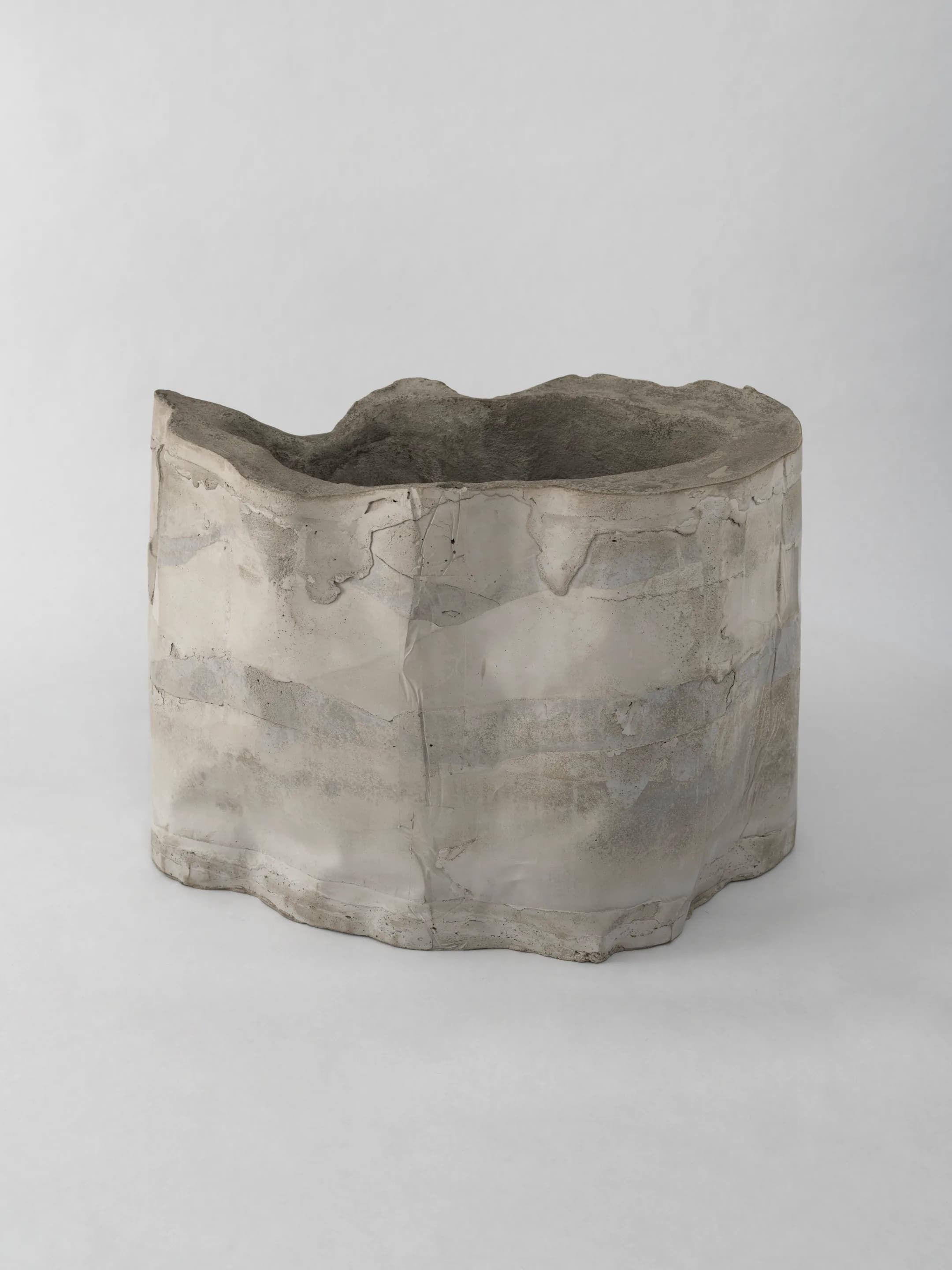 the anchor — a hand-formed concrete vessel